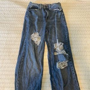Dark blue denim ripped jeans